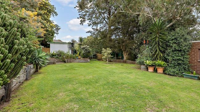 The property has a generous backyard.