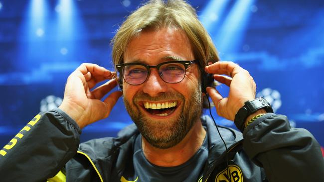 LONDON, ENGLAND - NOVEMBER 25: Jurgen Klopp manager of Borussia Dortmund laughs during a Borussia Dortmund press conference, ahead of the UEFA Champions League Group D match against Arsenal, at Emirates Stadium on November 25, 2014 in London, England. (Photo by Ian Walton/Getty Images)