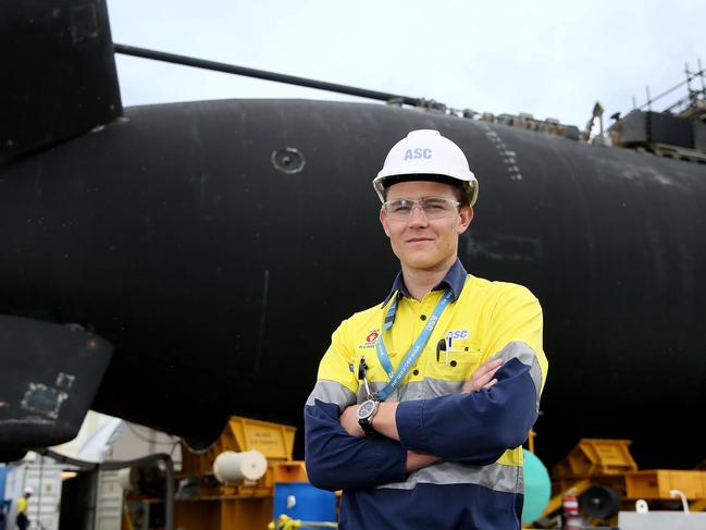 9/02/2017 Kerry Anstiss (22) is 9 months into the graduate program after finishing his mechanical engineering degree.Photographed in front of a submarine, Henderson. pic Colin Murty The Australian