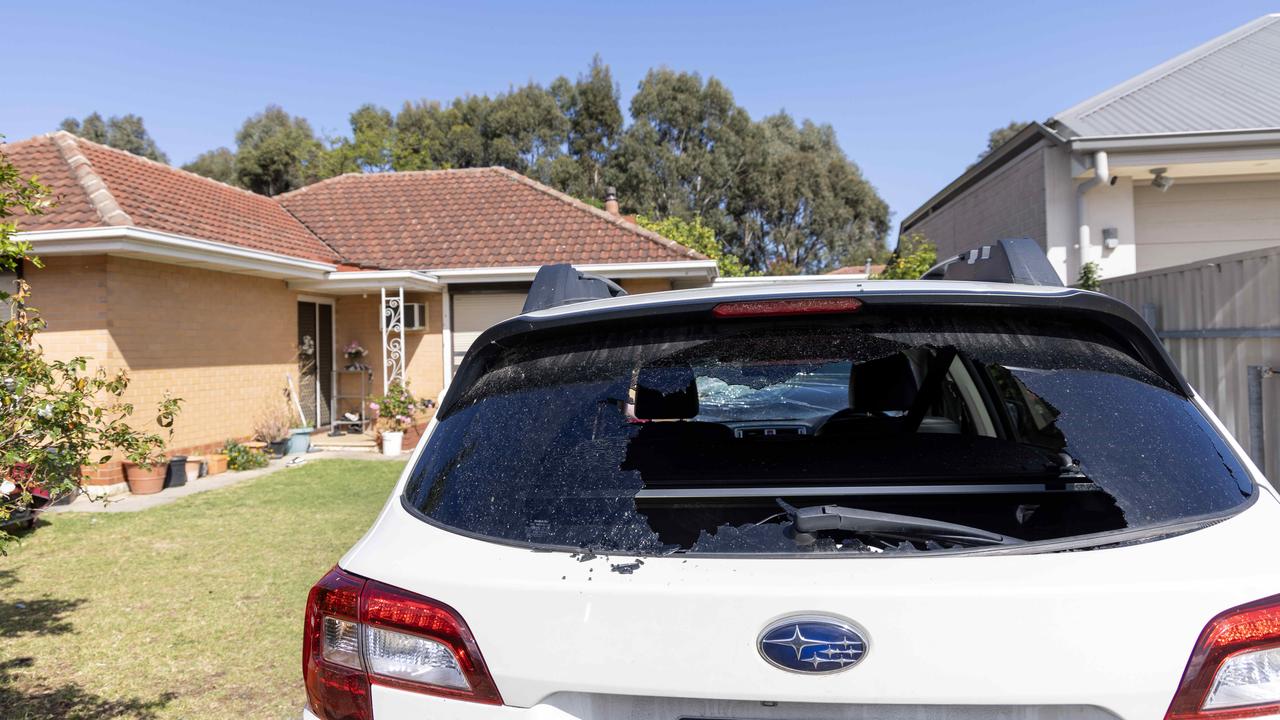 Three cars in the driveway were smashed up in the wild attack. Picture: Kelly Barnes