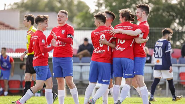 White City players celebrate during an NPL SA match last month. Picture: Adam Butler