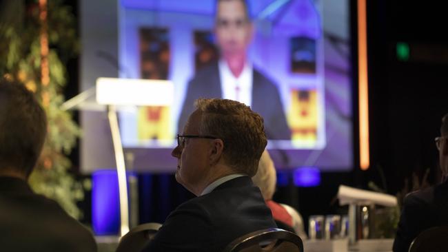 Governor of the Reserve Bank of Australia, Philip Lowe watching the address by the Treasurer Jim Chalmers.