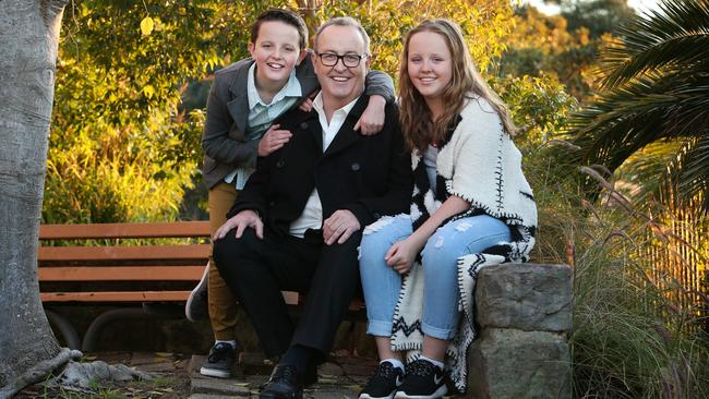 Morgan and Ashley with their dad in 2015. Picture: Richard Dobson