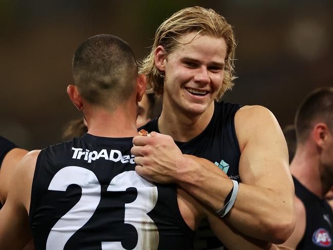 SYDNEY, AUSTRALIA - APRIL 01: Jacob Weitering and Tom De Koning of the Blues celebrate victory during the round three AFL match between Greater Western Sydney Giants and Carlton Blues at GIANTS Stadium, on April 01, 2023, in Sydney, Australia. (Photo by Mark Kolbe/Getty Images)