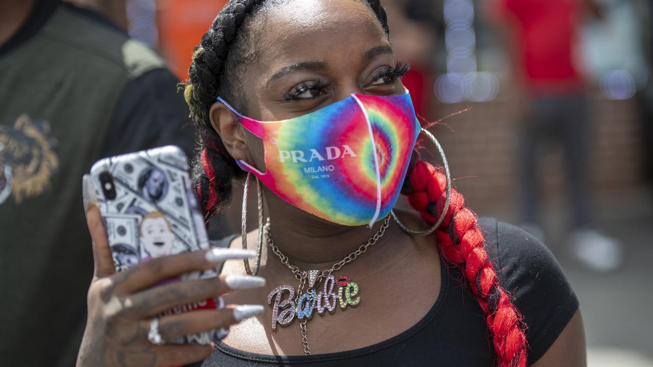 Sharron Worthy, 28, observes a protest march Philadelphia, Pennsylvania. Picture: Mark Makela/Getty Images/AFP