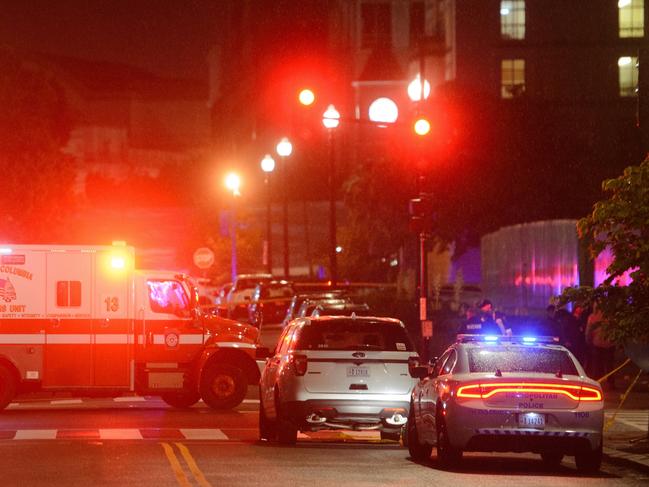 Law enforcement work the scene outside the Capital Jewish Museum. Picture: AP Photo/Rod Lamkey Jr