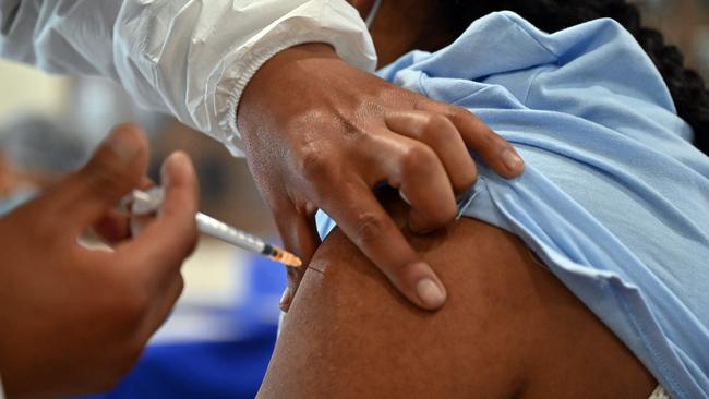 A woman is innoculated with a COVID-19 vaccine. Picture: AFP