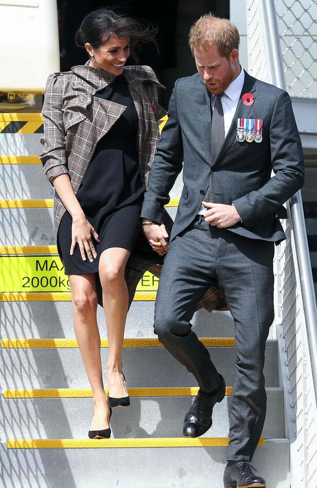 The couple changed before landing in Wellington International Airport Military Terminal on Sunday. Picture: AFP