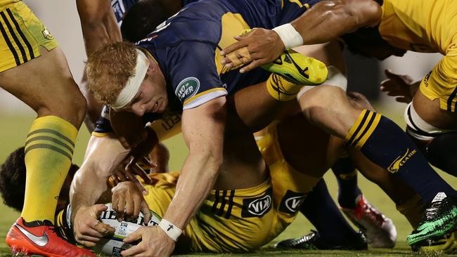 David Pocock doing what he does best, pilfering the ball at the breakdown. Picture: Getty Images 