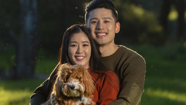 Tung Ngo, 28, and his wife Joanne Van, 28, are both physiotherapists who work in aged care. They recently suffered an income hit after losing extra casual shifts at another hospital which has delayed their ability to buy a bigger home. Picture: Rob Leeson.