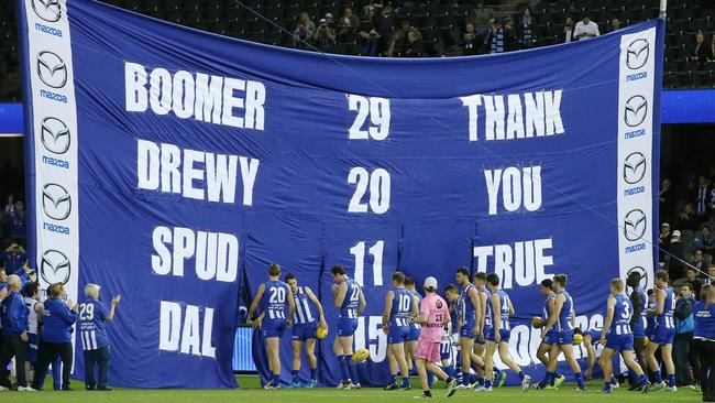 North Melbourne pays tribute to its club champions on its banner. Picture: Michael Klein
