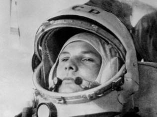 (FILES) In this file photo taken on April 12, 1961 Yuri Gagarin, 27, (1934-68) wears cosmonaut helmet, prepares to board Soviet Vostok I spaceship at Baikonur rockets launch pad shortly before its take-off. - On April 12, 1961, Soviet cosmonaut Yuri Gagarin becomes the first man in space, completing a single, 108-minute orbit. (Photo by - / AFP)