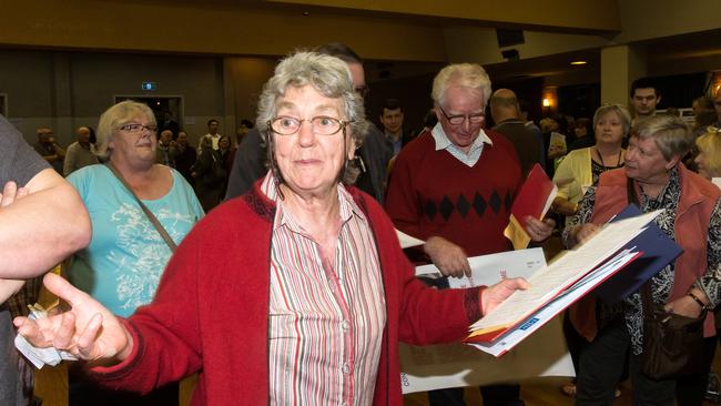 Sonia Rutherford of the Concerned Hume Residents Group attempts to address the crowd during the public meeting held tonight at the Broadmeadows Town Hall for residents concerned about the impacts of the Sunbury out of Hume split, on Monday 29th September, 2014. Picture: Mark Dadswell