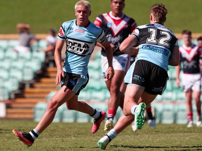 Sharks No.7 Jack Schumacher (left) passes to Blake Watman (No.12). Picture: Adam Wrightson Photography