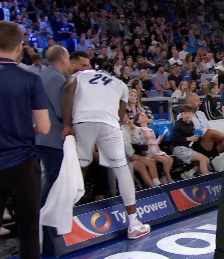 Vision showed Adelaide 36ers player Montrezl Harrell stepped into the fan area.