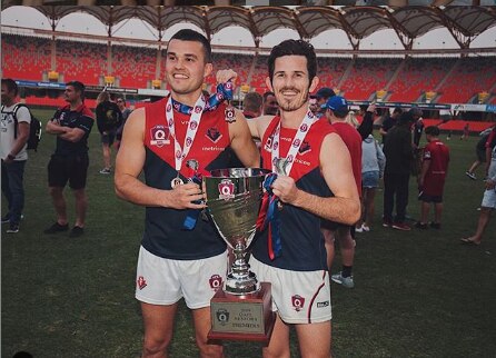 Jack Taylor (left) and Paddy Rankin (right) celebrate the Demons 2019 QAFL premiership. Pic: Supplied.