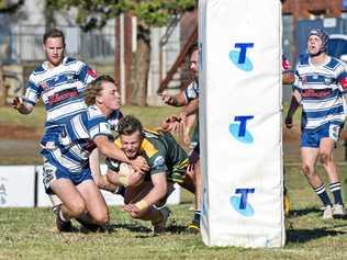 TRY TIME: Nicholas Van Der Poel scores for Wattles in his side's win over Brothers yesterday. Picture: Nev Madsen