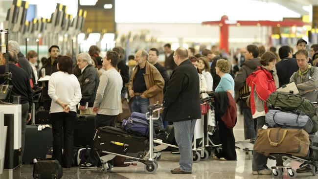 No-one would miss scenes like this at airports if biometric technology streamlined the departure process. Picture: News Corp Australia