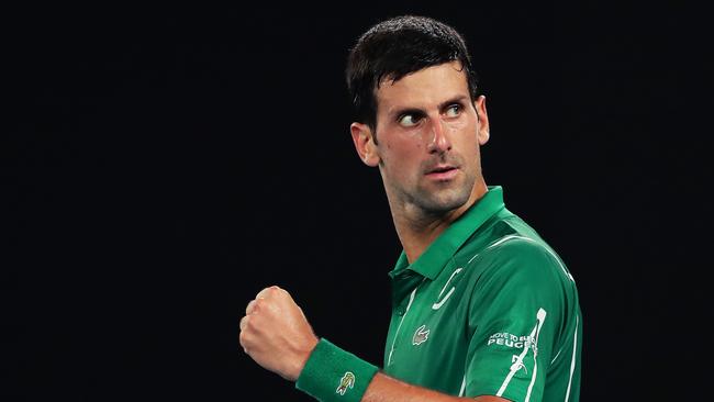 Novak Djokovic of Serbia celebrates after winning set point during his Men's Singles Semifinal match against Roger Federer. Picture: Getty