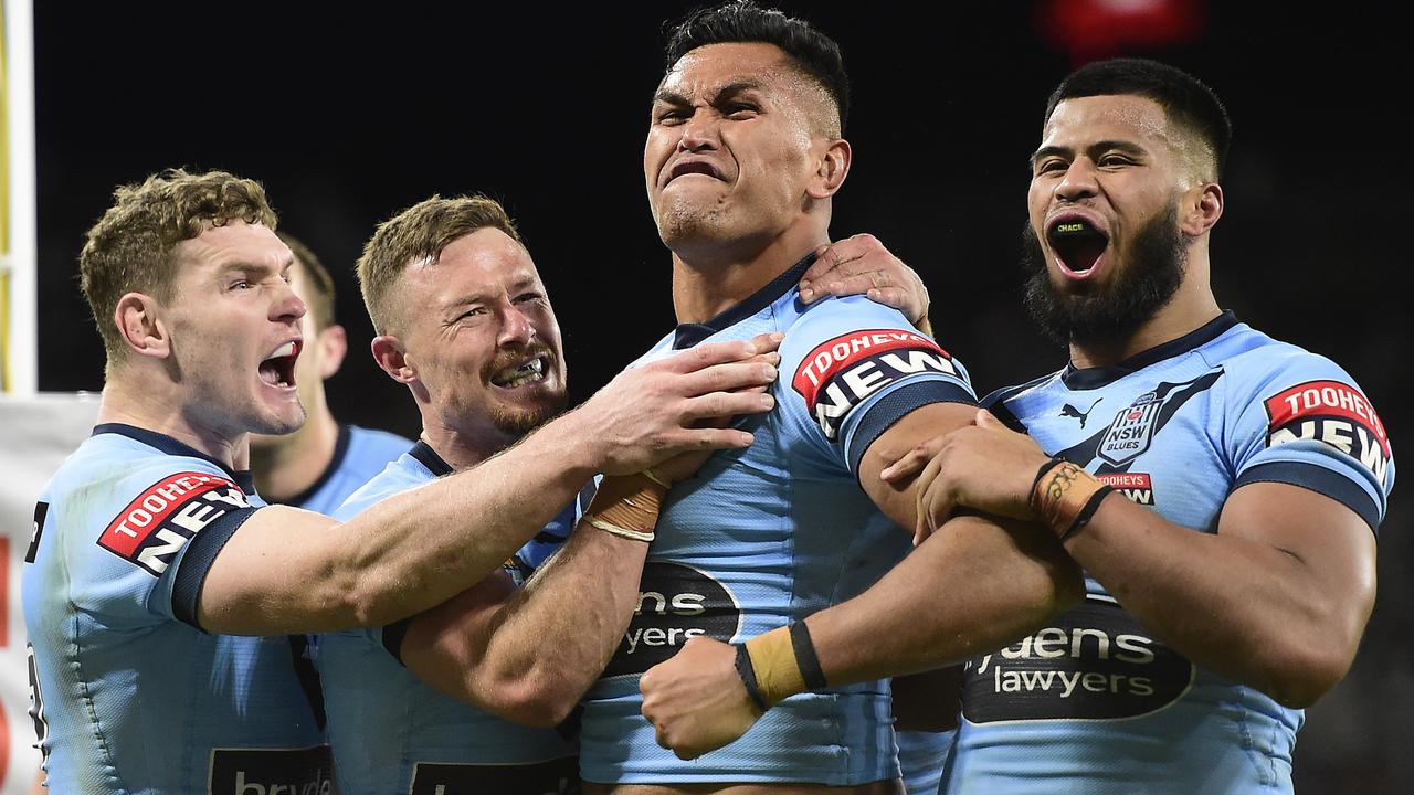 Daniel Saifiti celebrates after scoring during Origin I. Picture: Ian Hitchcock/Getty Images