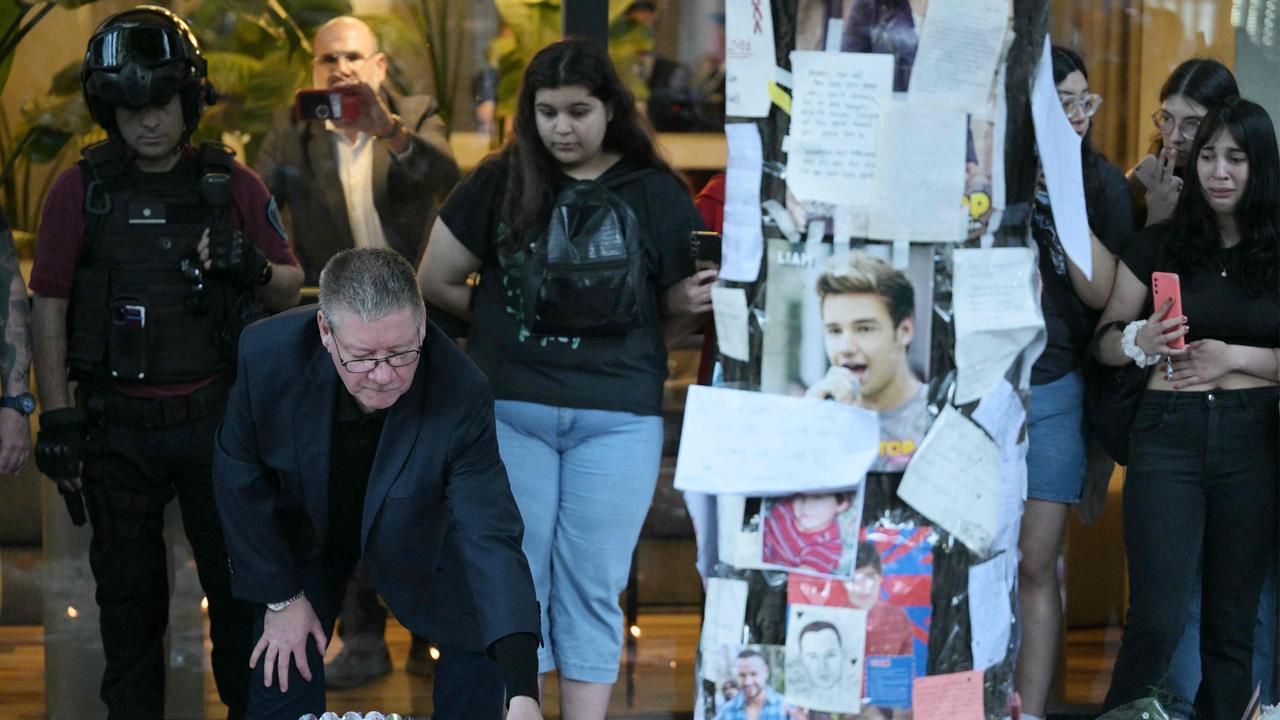 Geoff Payne, the father of One Direction pop singer Liam Payne, looks at a note placed where fans paid tribute to his late son outside the CasaSur Hotel. Picture: AFP