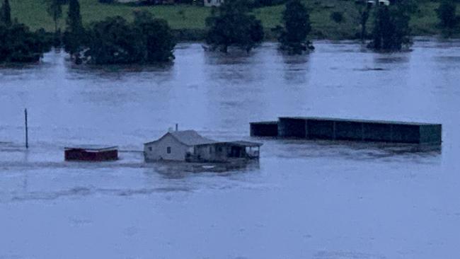 House being swept away in West Taree. Picture: Robert Cribb / Severe Weather Australia,