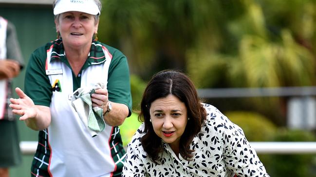 Annastacia Palaszczuk tries her hand at lawn bowls. Picture: Dan Peled