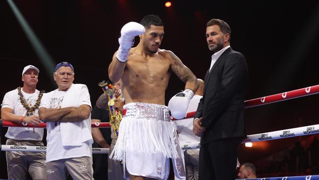 Australian heavyweight Jai Opetaia celebrates his victory over Englishman Ellis Zorro.