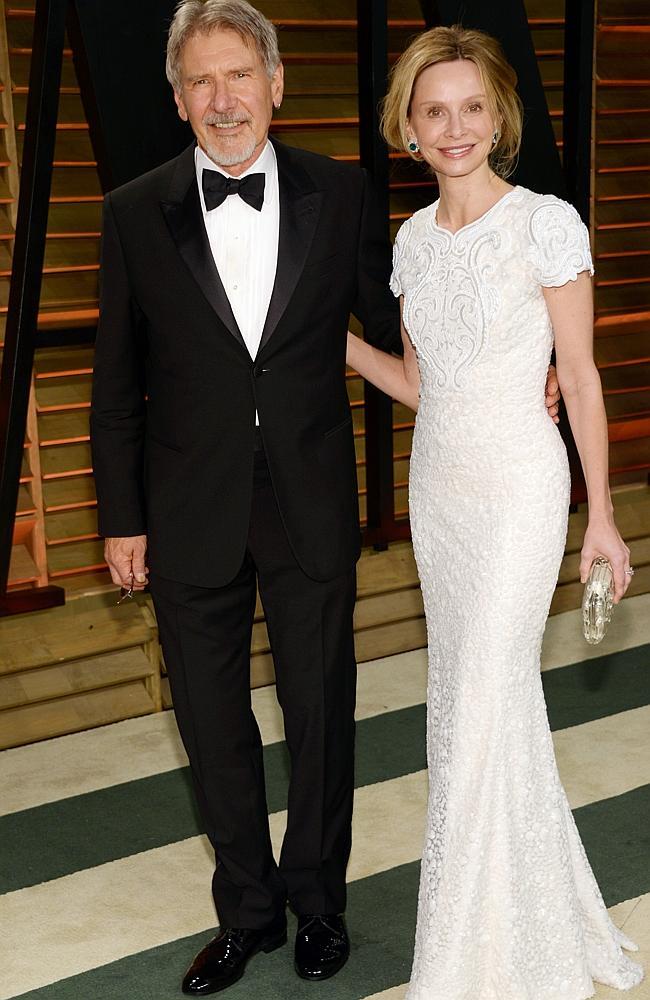 Harrison Ford, left, and Calista Flockhart attend the 2014 Vanity Fair Oscar Party, on Sunday, March 2, 2014, in West Hollywood, Calif.