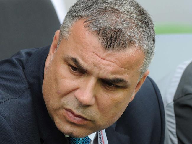 Aurelian Cosmin Olaroiu, coach of Saudi Arabia, looks on during the Group B Asian Cup football match between North Korea and Saudi Arabia in Melbourne on January 14, 2015. AFP PHOTO / MAL FAIRCLOUGH -- IMAGE RESTRICTED TO EDITORIAL USE - STRICTLY NO COMMERCIAL USE