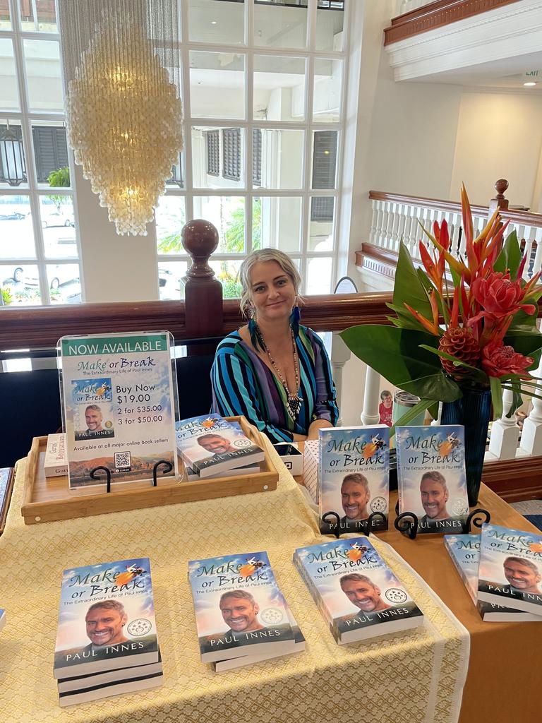 Summer Spencer with her employers book at the Cairns Tropical Writers Festival. Picture: Kristina Puljak