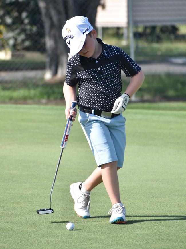 Brisbane's Charlie Simpson gets ready to make a putt on day one of the US Kids Golf Foundation Australian Open at the Rockhampton Golf Club on September 27.