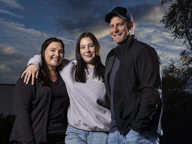 Louise and Daniel Newell with their 16-year-old daughter Leah. Picture Lachie Millard