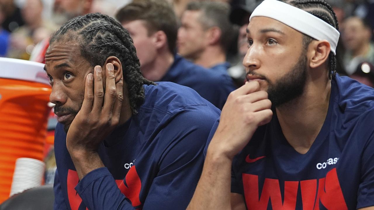 Simmons (right) was a spectator as the Clippers lost to Denver on the road in Game 7 to end their season in the first round. (AP Photo/David Zalubowski)