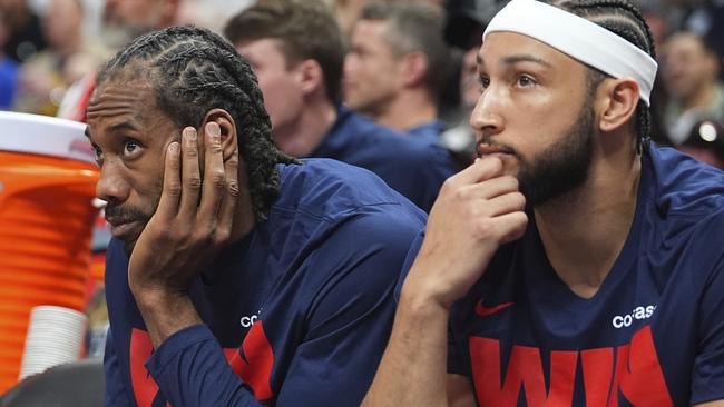 Simmons (right) was a spectator as the Clippers lost to Denver on the road in Game 7 to end their season in the first round. (AP Photo/David Zalubowski)