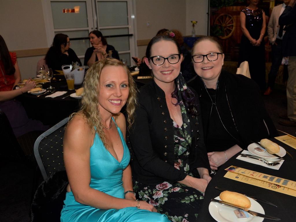 Brooke (L), Rebecca and Verushka (R) ready for a good night ahead at Warwick's Coppers Ball charity event on Saturday night.