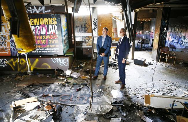 State Manager of Urban Jeff Curnow with design principal from Scott Carver, Peter St Clair inside the foyer of the Balmain Leagues Club earlier in the year. It has been left derelict since 2009. Picture: John Appleyard