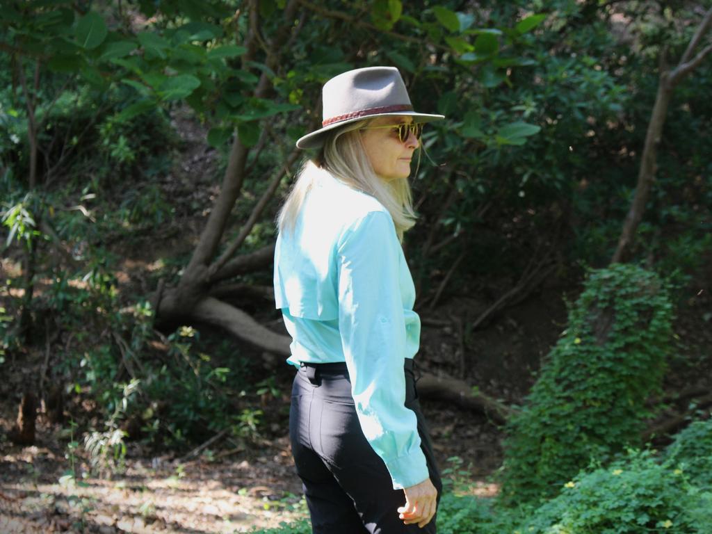 Territory Coroner Elisabeth Armitage inspects the path down to the Katherine River where police believe Shane Tapp entered the water and drowned. Picture: Jason Walls