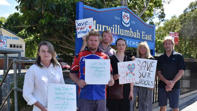 Karina Bale, David Platen, Soenke Biermann, Lisa Tiffen and Paula and Barry Miller at Murwillumbah East Public School protesting the development. Picture: Jessica Lamb