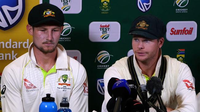 Australia’s Cameron Bancroft (left) and Steve Smith at a press conference in Cape Town where they admitted ball tampering. Picture: AFP  