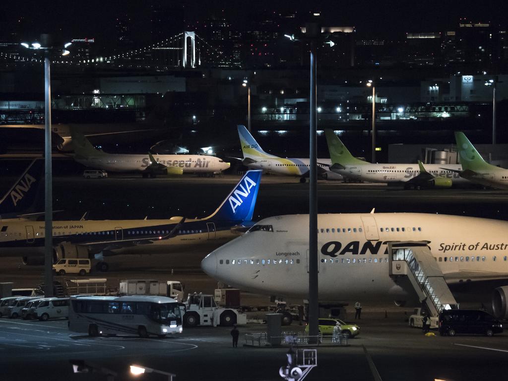 The Qantas flight prepares to leave Haneda Airport. Picture: Tomohiro Ohsumi/Getty Images