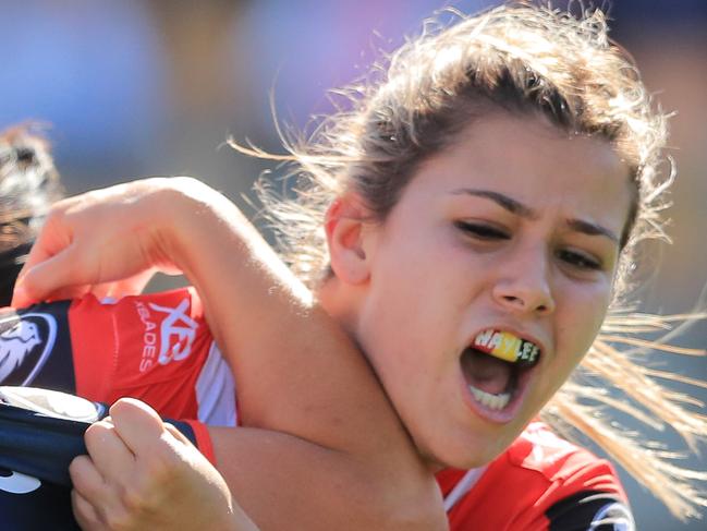 SYDNEY, AUSTRALIA - SEPTEMBER 29: Shaylee Bent of the Dragons tackled Ruan Sims of the Roosters during the NRLW match between the St George Illawarra Dragons and the Sydney Roosters at Leichhardt Oval on September 29, 2019 in Sydney, Australia. (Photo by Mark Evans/Getty Images)