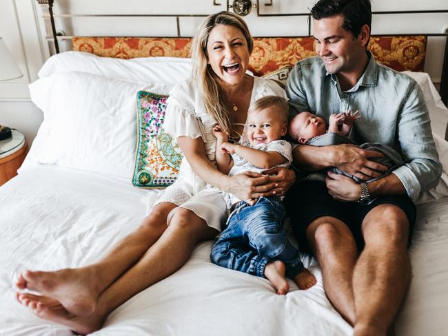 Liz Cantor with her newborn baby Fin, husband Ryan Lysaught and son Kit.