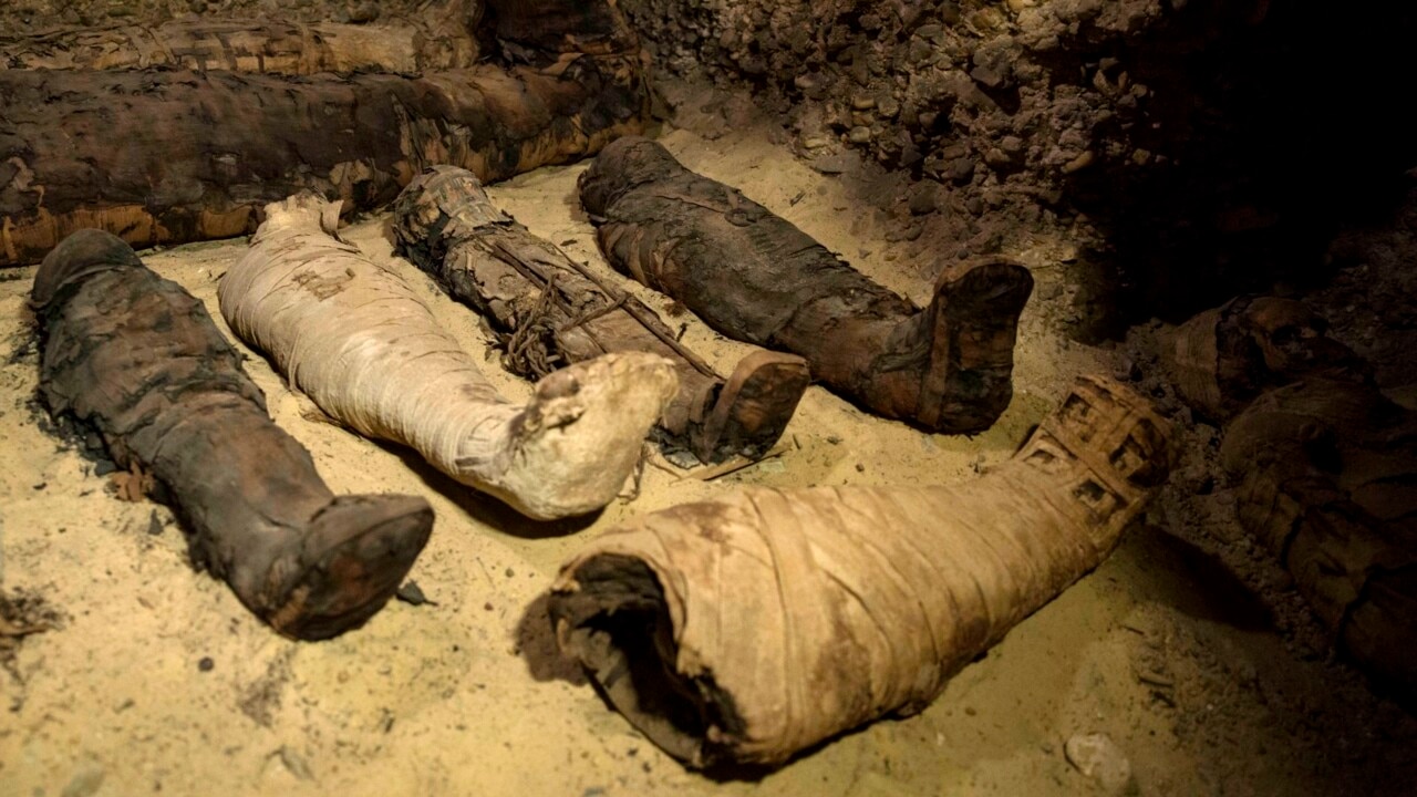 Egyptian archaeologists uncover 50 mummies at ancient burial site