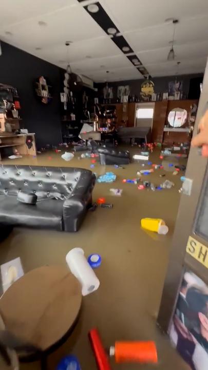Devastating scenes show completely flooded barber shop