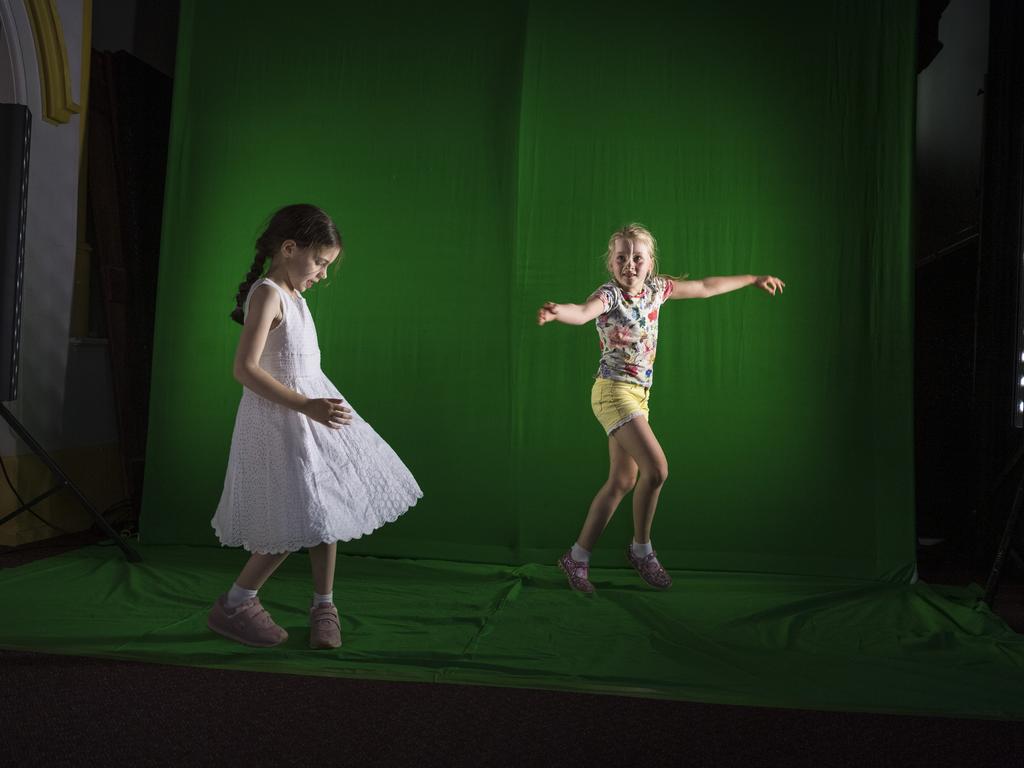 Dancing in front of a green screen are Alexa Cockburn (left) and Sabine Conroy in the Garden of Curiosity during the Curious Arts Festival at Empire Theatres, Friday, October 16, 2020. Picture: Kevin Farmer