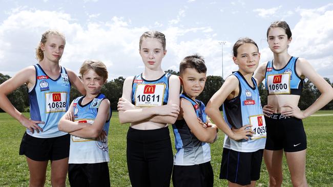 DAILY TELEGRAPH – Pictured in Rouse Hill today are Little Athletic kids (L-R) Flynn Cowper 12, Zane Cowper 9, Ella Caines 10, Oliver White 8, Evelyn White 10, and Lily Caines 12, who aren't able to return to the sporting field until December. Picture: Tim Hunter.