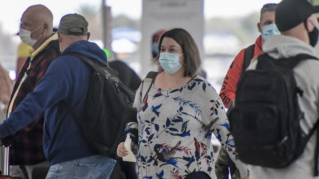 The strong advice for South Australians to wear masks indoors has been lifted. Picture: NCA NewsWire / Roy VanDerVegt