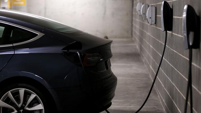 A Tesla Model Y charges at a EV charge station in Lane Cove, Sydney. Picture: Brendon Thorne/Getty Images