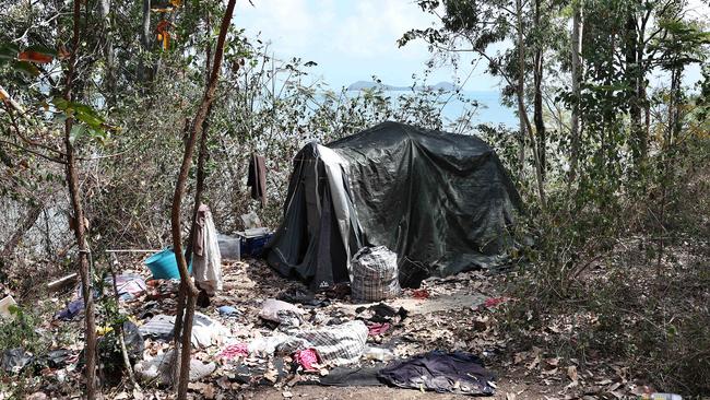 An abandoned tent on the property's headland with a view of Double Island in the background Inside the tent were kitchen items, bedding and toilet paper. Picture: Brendan Radke